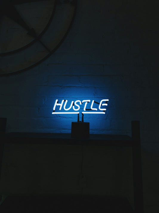 hustle LED signage turned on