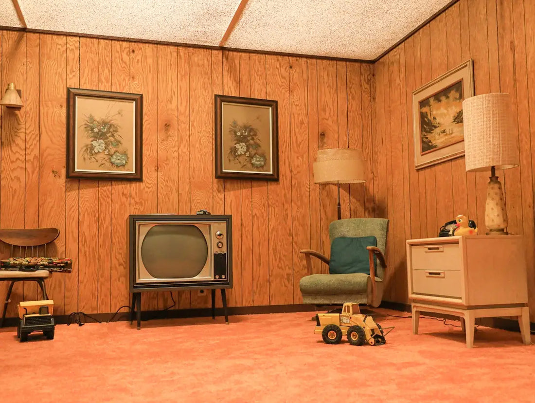 a living room with a television and a toy car