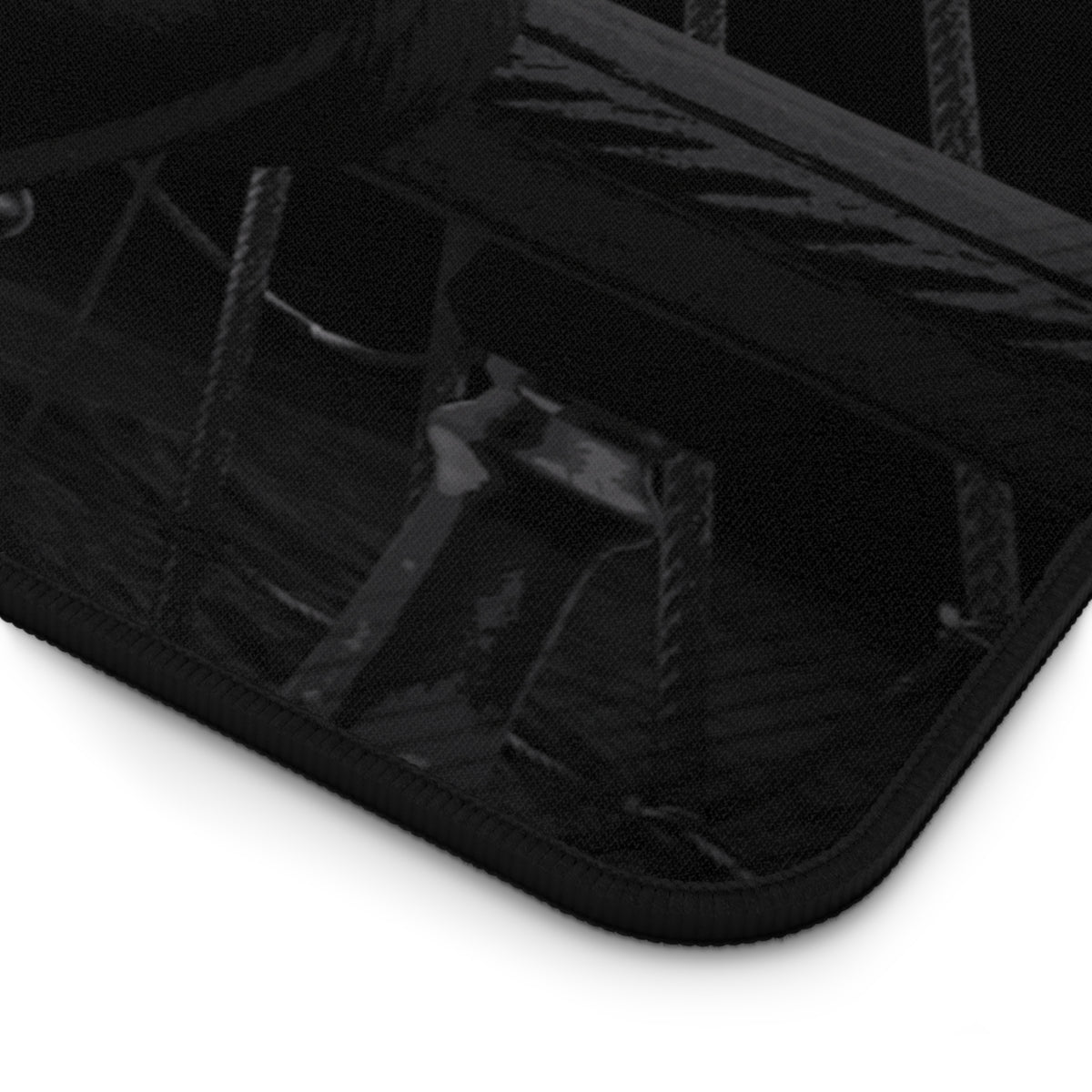 Close-up of a black textured zippered pouch or organizer with a reinforced black zipper edge, shown on a white background.