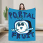 Person holding a blue blanket with 'Portal Fruit' design in a room with a cactus plant.