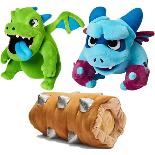 Two plush dragons, one green and one blue, with a brown log toy featuring spikes on a white background.