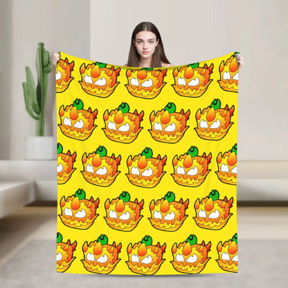 Person holding a large yellow towel with cartoon character pattern