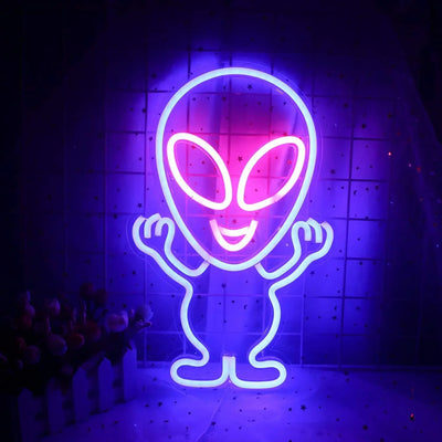 a neon sign with an alien on it