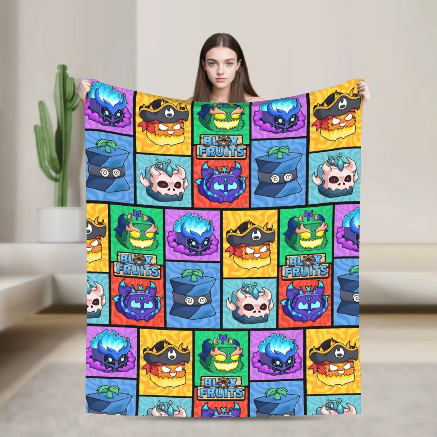 Person holding a colorful blanket with cartoon character patterns