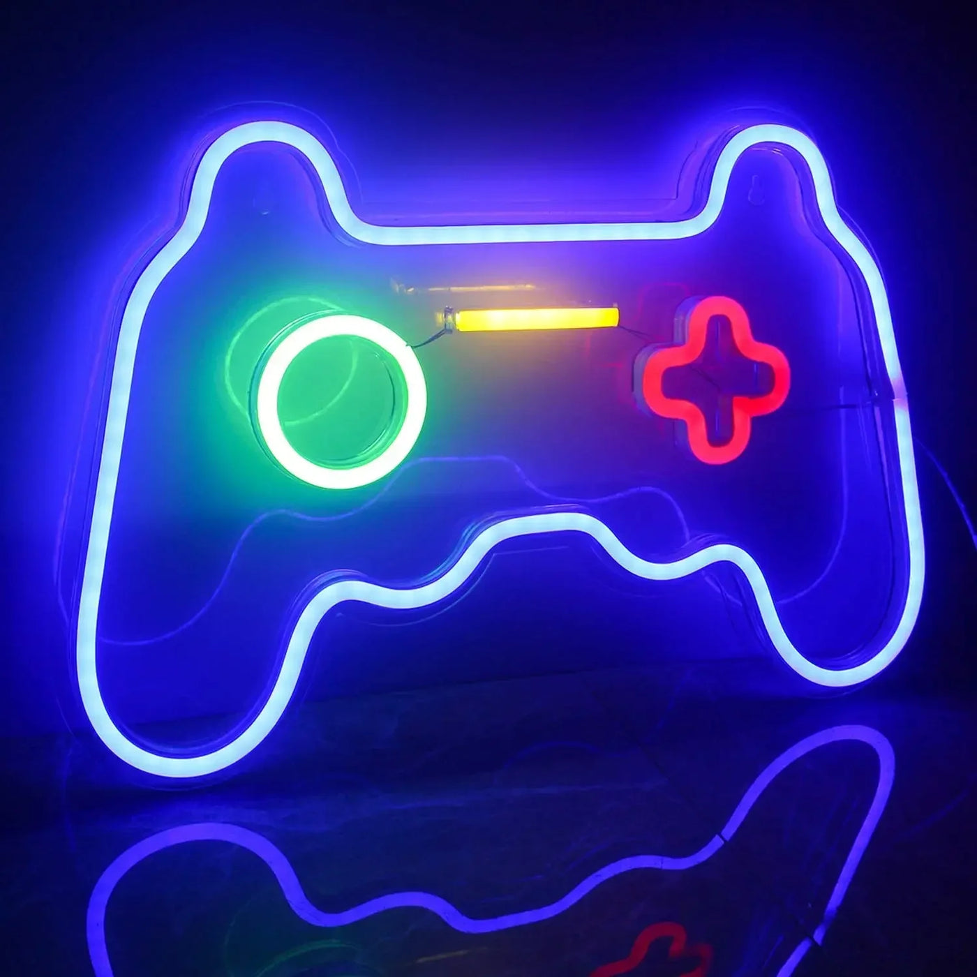 a video game controller lit up in the dark