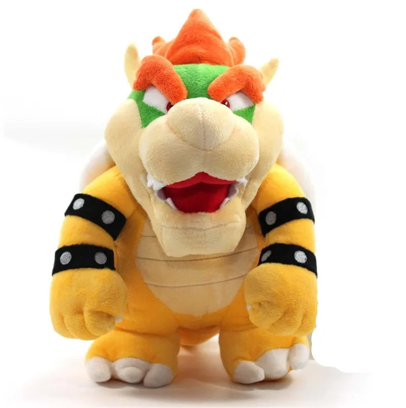 Plush toy resembling Bowser from Super Mario on a white background