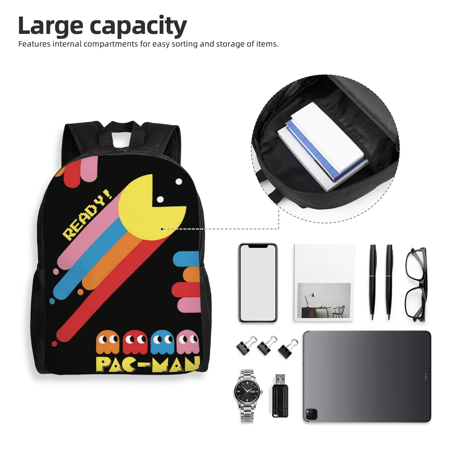 Pac-Man backpack with colorful design and compartments filled with items on a white background