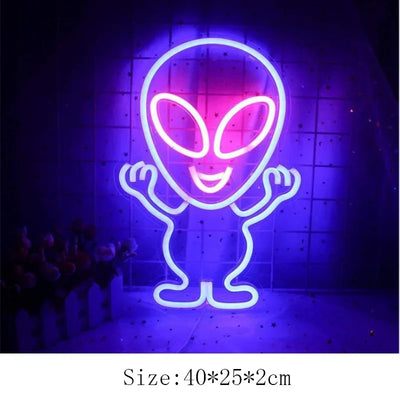 a neon sign with an alien on it