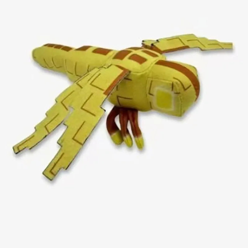 Yellow and brown toy spider on a white background