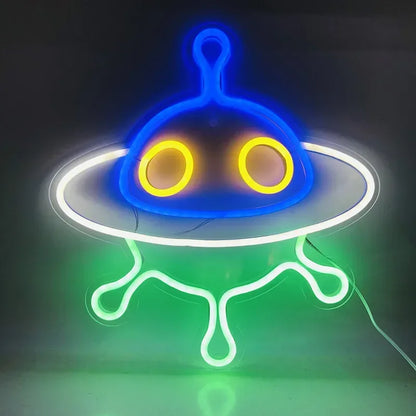 a neon sign that has a neon alien on it