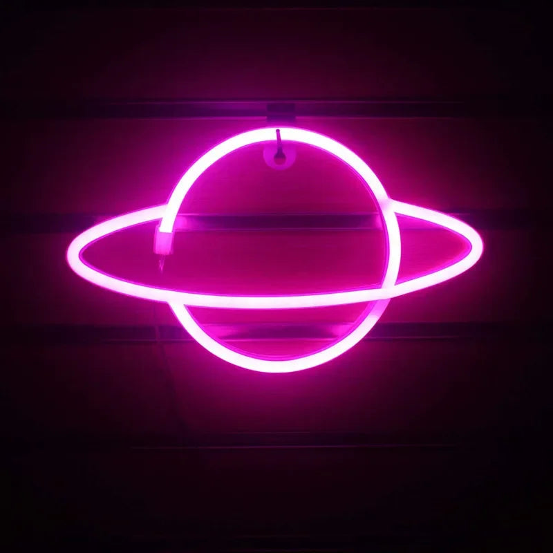 a neon sign that is hanging on a wall