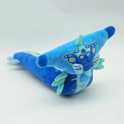 Blue plush toy with a dragon design on a white background