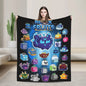 Person holding a blanket with colorful cartoon fruit designs and 'Block Fruits' branding.