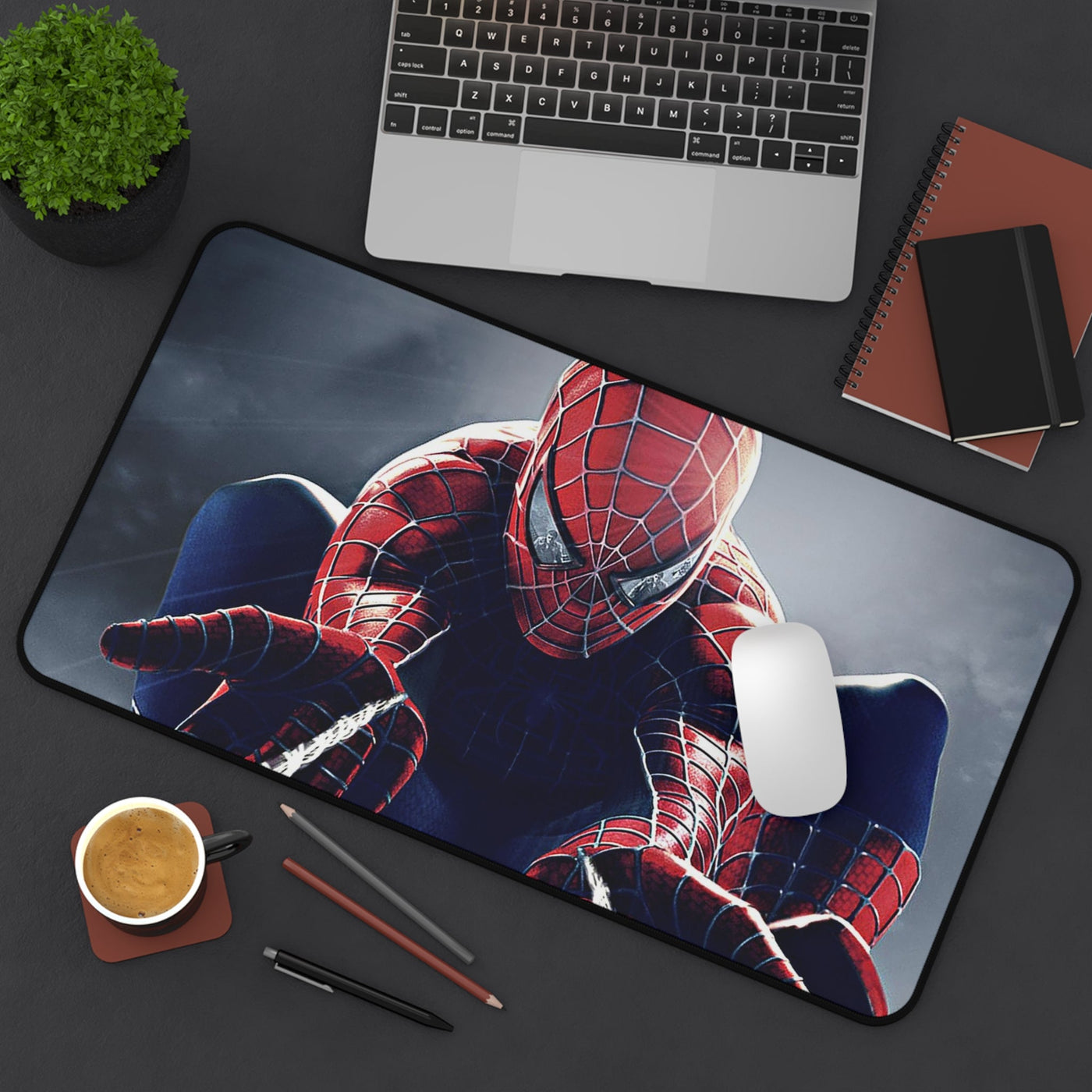a mouse pad with a picture of a spider man on it