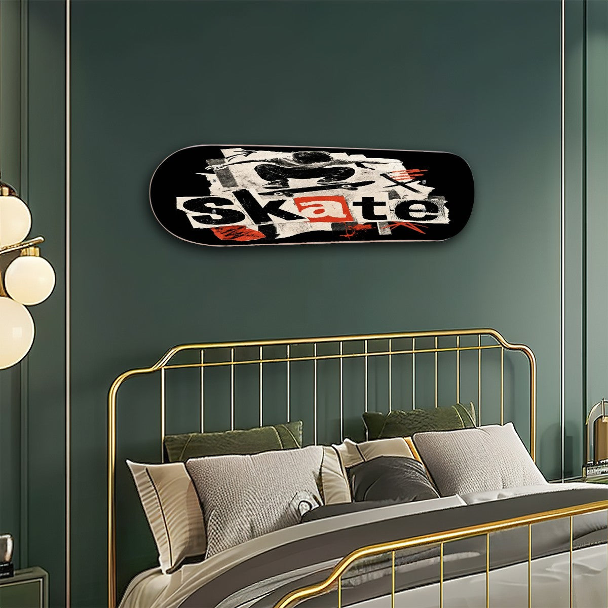 A skateboard wall art print with a black background and a collage-style graphic featuring the word 'skate' in white, displayed above a bed in a modern bedroom with a gold metal headboard and dark green walls.