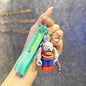 Funny Zombie Keychain for Gamer Gifts and Video Game Merchandise - C